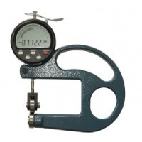 Thickness gage for moving film